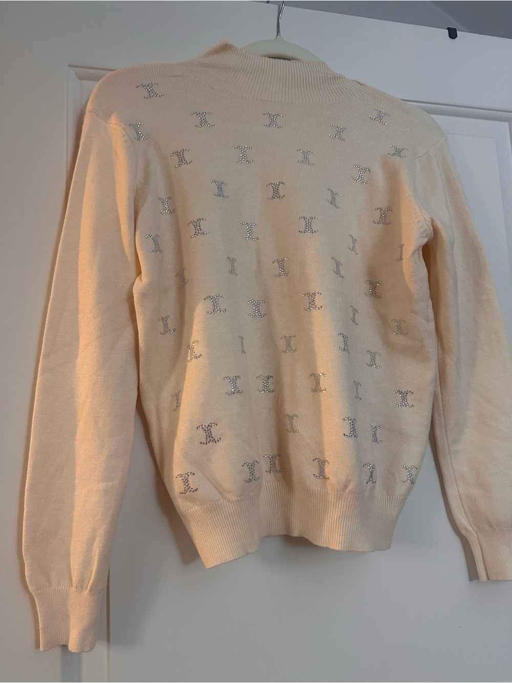Cream Knit Turtleneck Sweater with Subtle Logo Detail